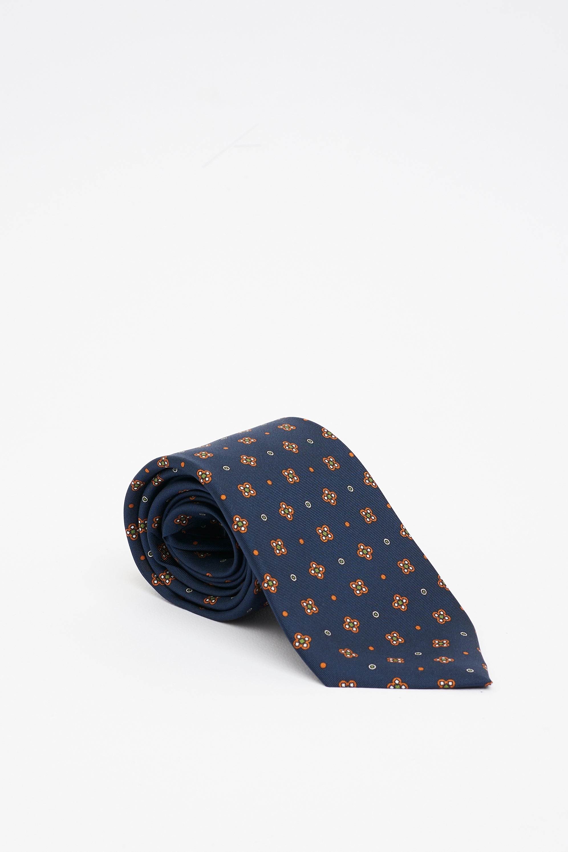 Cravatta in Seta Blu con Motivo a Fiori Geometrici