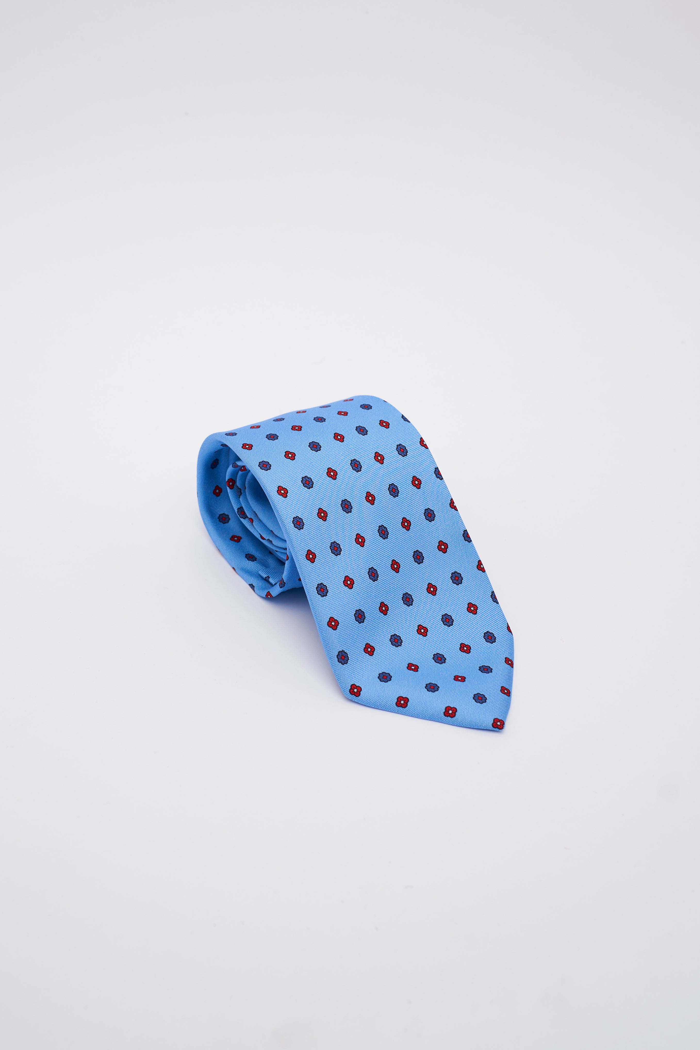 Cravatta in Seta Celestina con Fiori Blu e Rossi