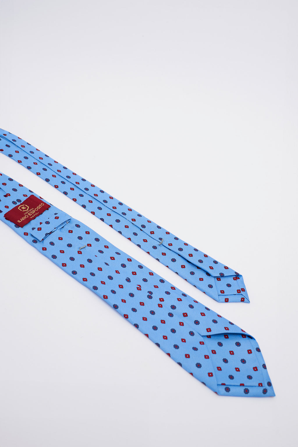 Cravatta in Seta Celestina con Fiori Blu e Rossi