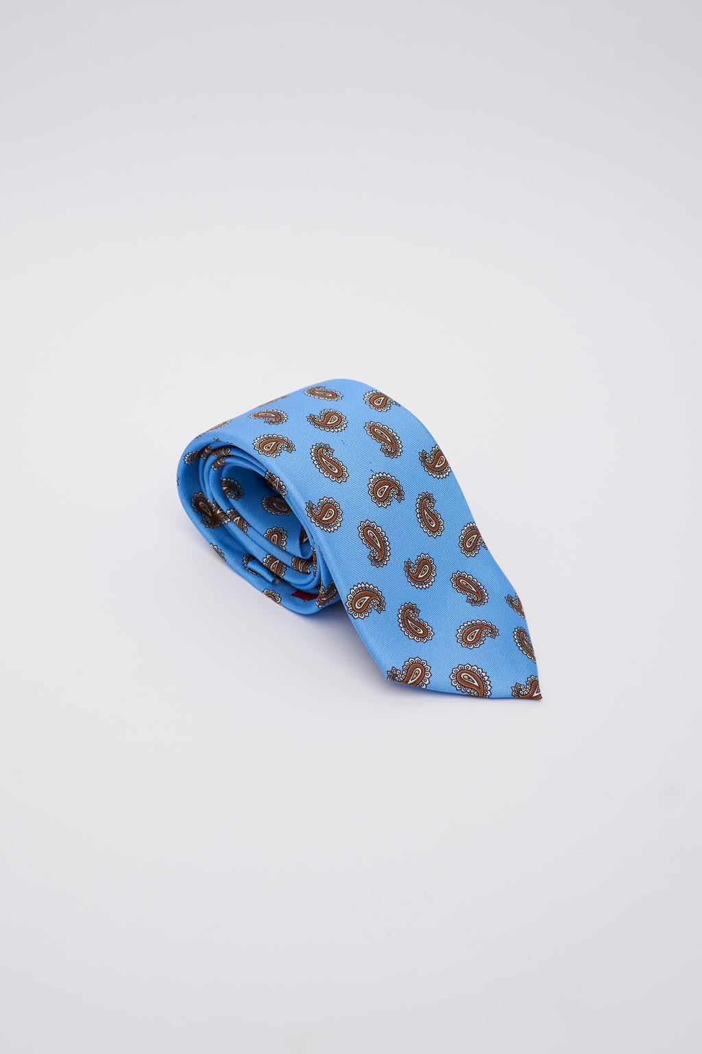 Cravatta in Seta Celeste con Disegno Marroncino