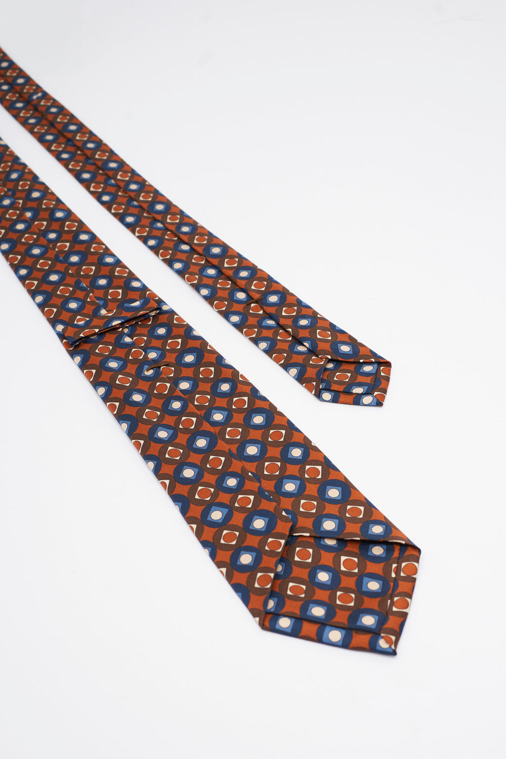 Cravatta in Seta sui Toni dell'Arancione e Blu