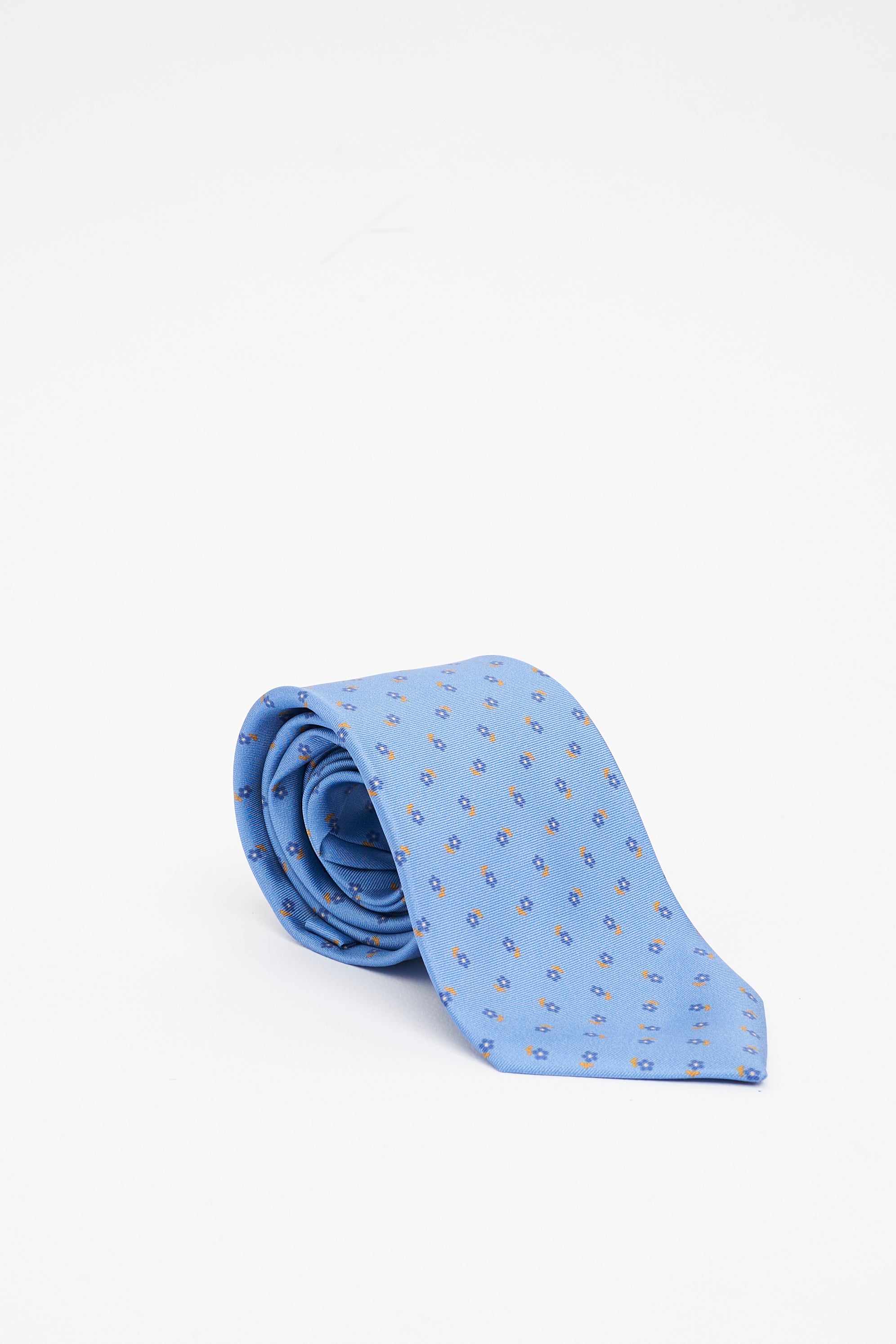 Cravatta in Seta Azzurra con Motivo a Piccoli Fiori